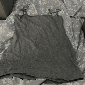 I’m selling  this cute tank top, has been worn couple times